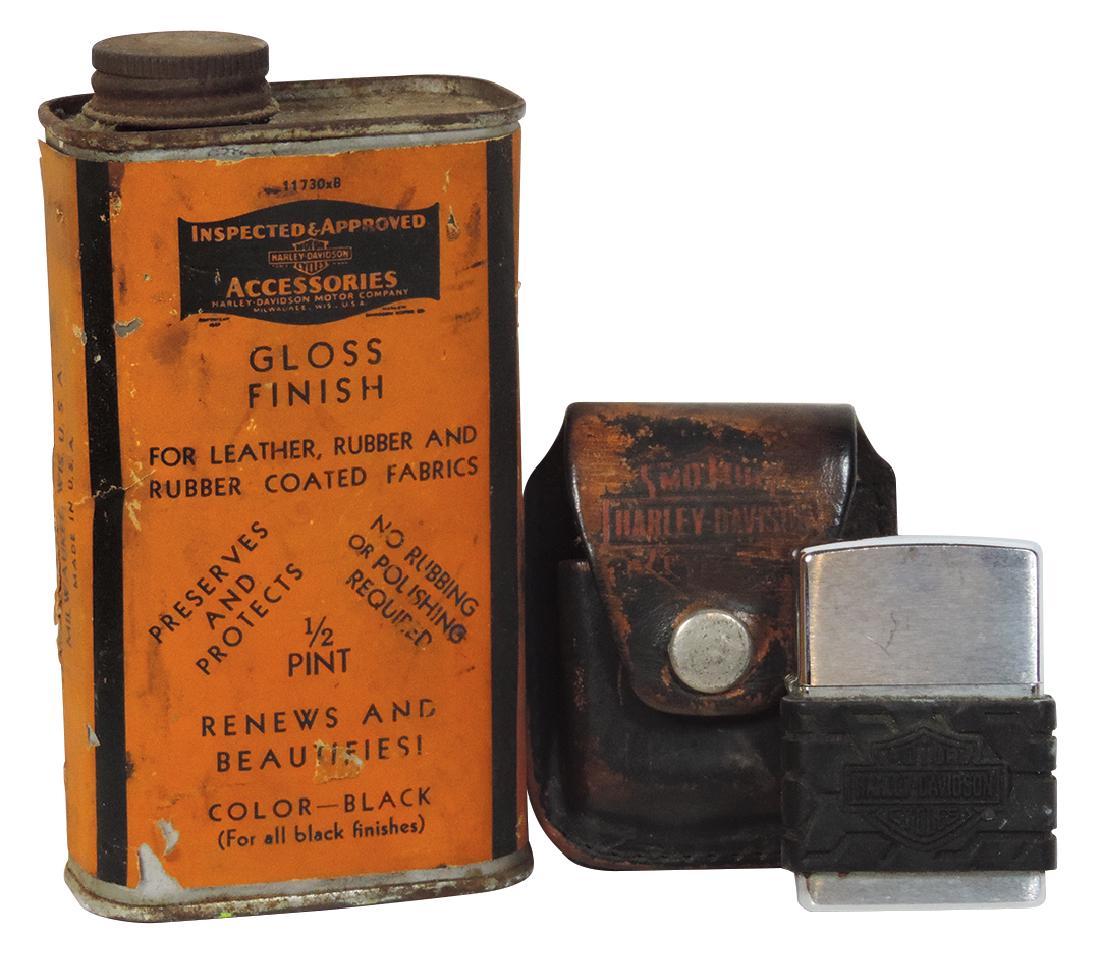 Harley-Davidson Gloss Finish tin & lighter in leather: Harley-Davidson Gloss Finish tin & lighter in leather case (2), Rare 1/2 pint tin w/bar & shield logo on paper label, renews & beautifies leather & rubber, Good cond w/some paper loss on back, 5.5"H &