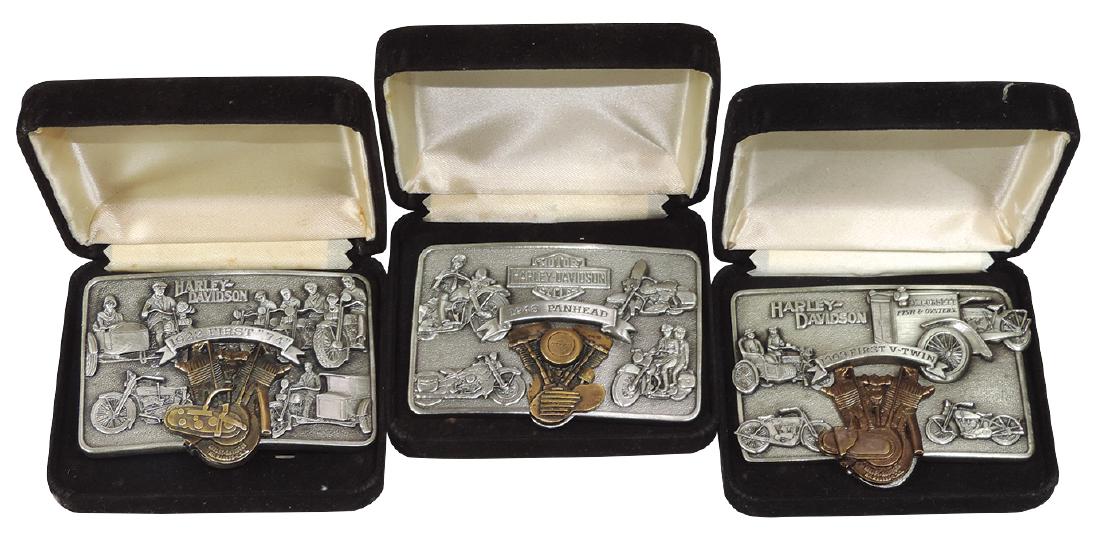 Harley-Davidson Limited Edition belt buckles (3), 1909: Harley-Davidson Limited Edition belt buckles (3), 1909 First V-Twin, 1922 First "74" & 1948 Panhead, all created for Harley-Davidson by Brookfield Collector's Guild in 1983, all Exc cond in orig velve