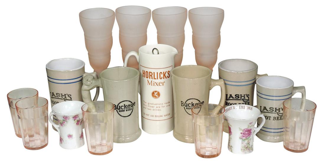 Soda fountain mugs & glasses (17), 2 Buckeye Root Beer: Soda fountain mugs & glasses (17), 2 Buckeye Root Beer stoneware mugs, 1 w/gargoyle handle, 3 Lash's Root Beer stoneware mugs, 4 frosted pink soda glasses, 5 pink Depression water glasses, 2 Cudahy's