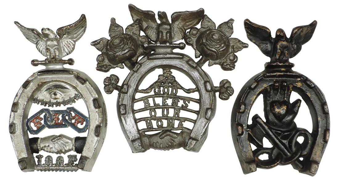 Fraternal horseshoe trivets (3), Odd Fellows, Odd Fello: Fraternal horseshoe trivets (3), Odd Fellows, Odd Fellows w/heart in hand & "God Bless Our Home" Odd Fellows w/clasped hands, all w/Eagles, VG & Exc cond, 7"H x 6.5"W.