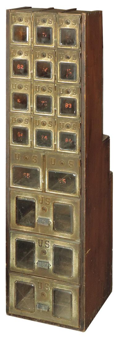 Country store post office mailboxes, wood w/metal: Country store post office mailboxes, wood w/metal fronts marked "U.S.", 17 lock boxes, open cubbies at back, c.1915, VG cond w/a good look, no keys, 46"H x 12"W x 14"D.
