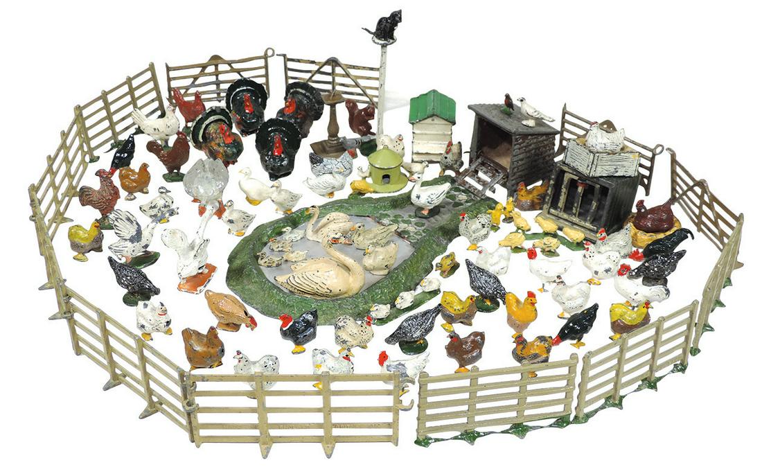 Britains & JOHILLCO lead farm animals (approx 85),: Britains & JOHILLCO lead farm animals (approx 85), turkeys, chickens, geese, swans, ducks, cat, baby chicks, pond, birdhouse, birdbath, cages, 12 pcs of fencing, feeder & squirrel, c.1920-1930's, VG &