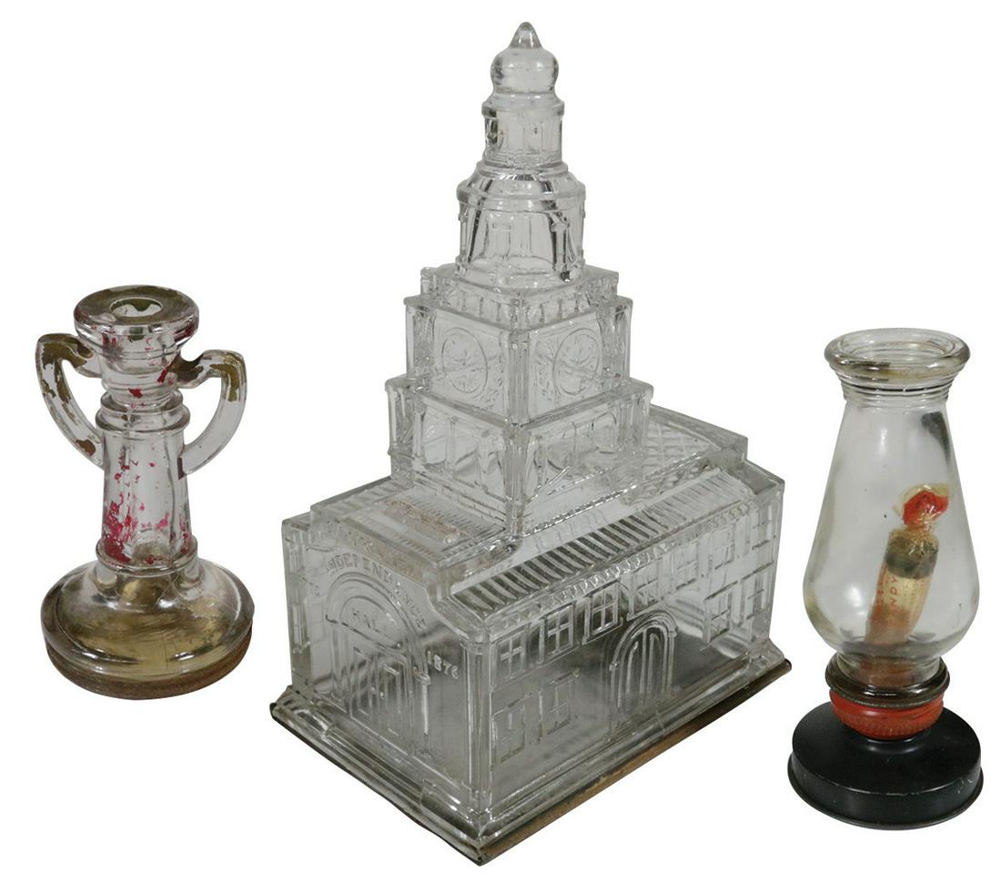 Candy containers & candy container/bank (3), Bank of: Candy containers & candy container/bank (3), Bank of Independence Hall, embossed on side w/coin slot, Candlestick Holder & Lantern, all glass w/tin closures, some chipping on Independence Hall (mainly