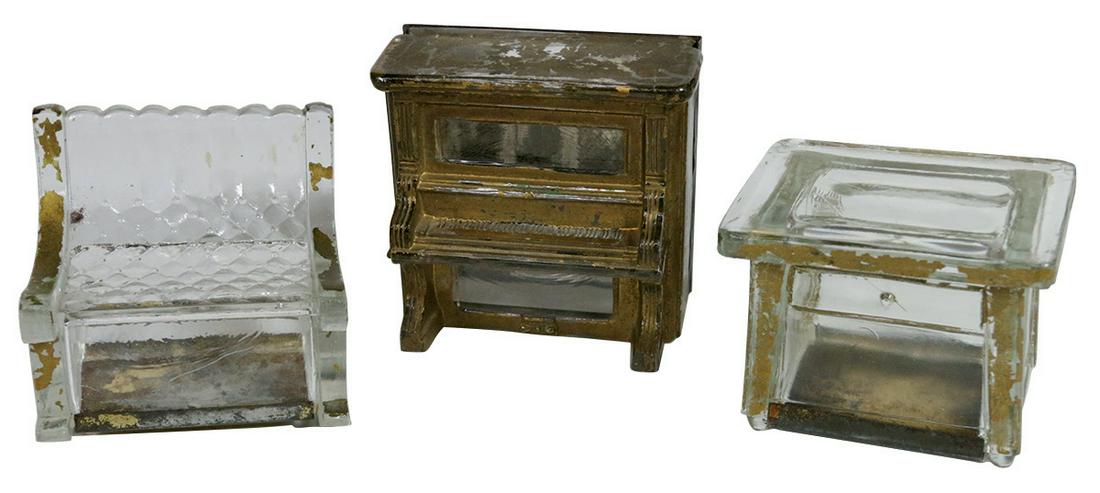 Candy containers & candy container/bank (3), Table, a: Candy containers & candy container/bank (3), Table, a few minor chips along top edge, Piano bank w/gold paint & coin slot on back & Rocker, all glass w/tin closures in VG cond unless noted, 2" to 2.75