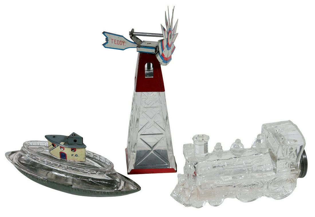Candy containers (3), Teddy Windmill, by West Bros. Co.: Candy containers (3), Teddy Windmill, by West Bros. Co. #2862, pressed glass w/litho on tin marked "Teddy" on one side "American Flag" on other, Geo. Borgfeldt Boat, label on bottom, missing flag & Lo