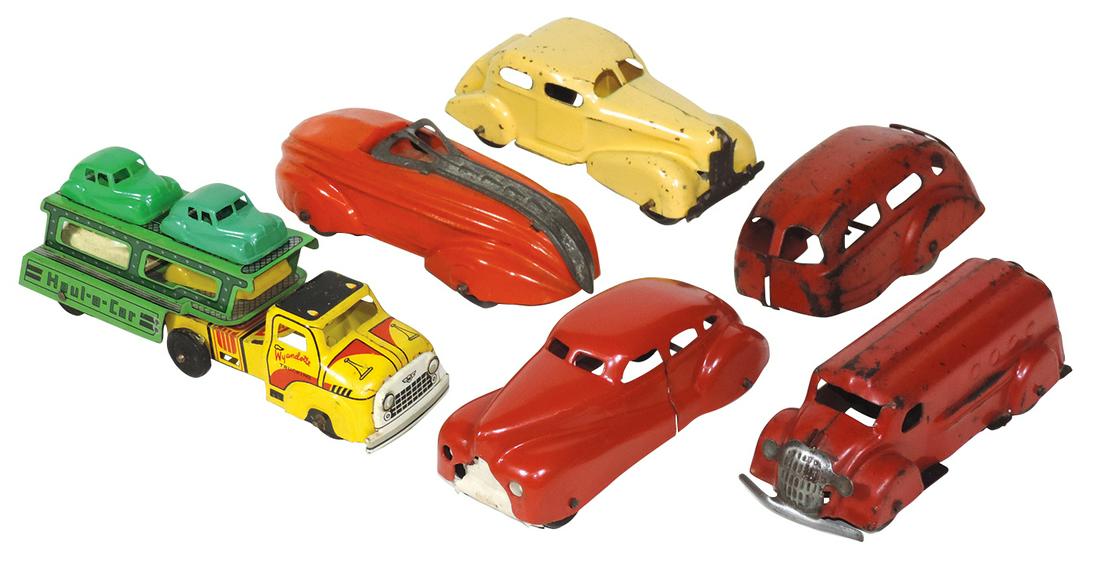 Toys (5), all Wyandotte, orange 1937 Speedster, red: Toys (5), all Wyandotte, orange 1937 Speedster, red 1936/40 bank truck, yellow cab/green trailer w/4 cars small car hauler, red 1939/41 touring sedan & yellow 1938 sedan w/red trailer (no hitch), all 