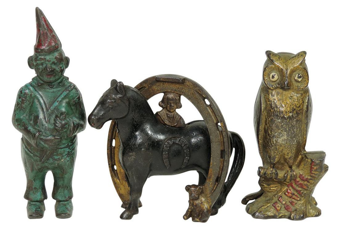 Still banks (3), A. C. Williams "Be Wise Owl",: Still banks (3), A. C. Williams "Be Wise Owl", c.1912-1920's, A. C. Williams "Clown", c.1908 & Arcade Buster Brown & Tige "Good Luck Horseshoe", c.1908-1932, all cast iron, VG to Exc cond, up to 6.5"H