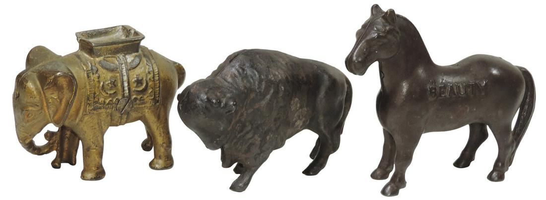 Still banks (3), Arcade "Beauty", Beauty embossed on: Still banks (3), Arcade "Beauty", Beauty embossed on side of horse, c.1910, A. C. Williams "Elephant with Howdah", c.1912 & Arcade/A. C. Williams "Buffalo", c.1920's, all painted cast iron in VG to Ex