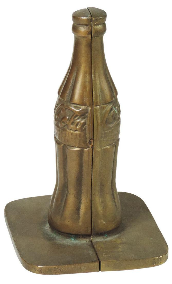 Coca-Cola bottle-shaped bookends, bronze, c.1963, Exc: Coca-Cola bottle-shaped bookends, bronze, c.1963, Exc cond, ea 7.5"H x 5"W.