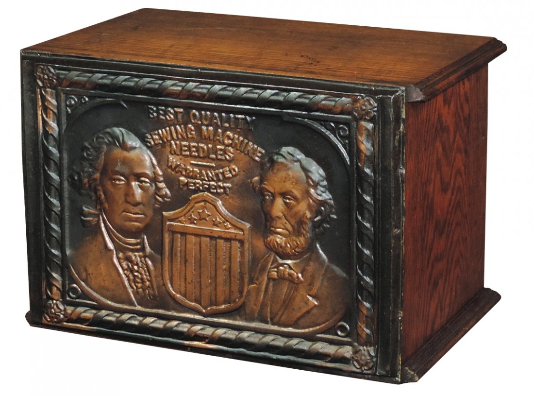 Country store needle case, Best Quality Sewing Machine: Country store needle case, Best Quality Sewing Machine Needles, embossed metal front w/busts of Washington, Lincoln & Stars & Stripes medallion, oak w/3 drwrs at back w/porcelain pulls, Very Unusual, 