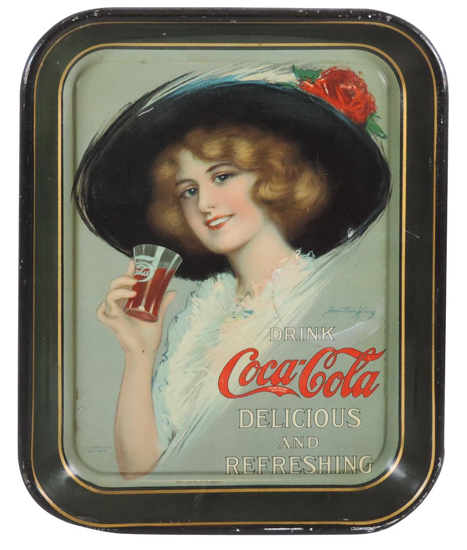 Coca-Cola serving tray, 1910, Hamilton King Girl: Coca-Cola serving tray, 1910, Hamilton King Girl w/Black Hat, litho on metal by Passiac Metal Ware Co., Exc cond w/minor edge wear, 13.25"H x 10.5"W.