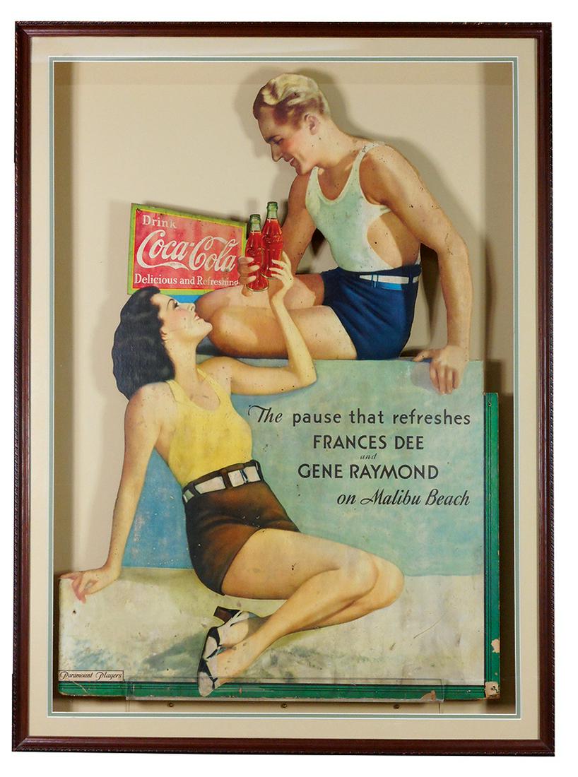 Coca-Cola diecut cdbd window display sign, Frances Dee: Coca-Cola diecut cdbd window display sign, Frances Dee & Gene Raymond on Malibu Beach, Rare, Paramount Players, c.1933, elaborately framed in shadow box, Good+ to VG cond with o/all wear, 42"H x 30.5"