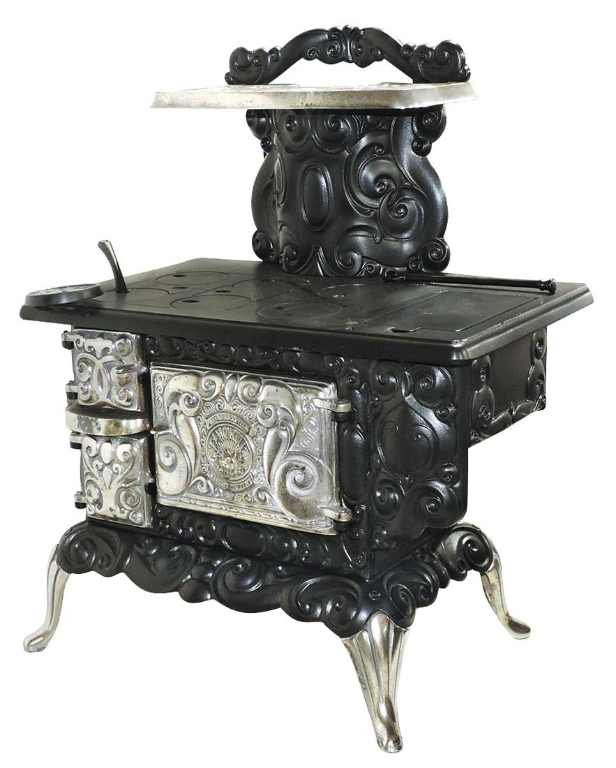Salesman sample or child's stove, Favorite, large: Salesman sample or child's stove, Favorite, large nickel-plated & black finish cast iron 6-burner w/reservoir, top shelf & front trivet, all parts present, Exc cond, 23.5"H x 17"W.