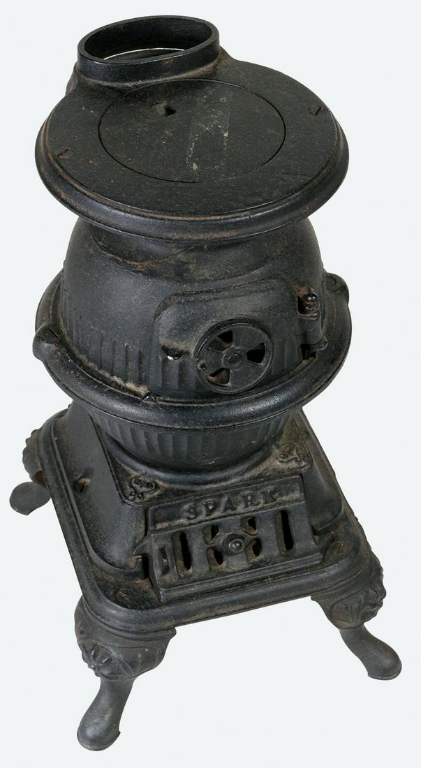Salesman sample stove, Spark Pot Belly, cast iron: Salesman sample stove, Spark Pot Belly, cast iron w/orig surface, Exc cond, 14"H x 8"W.