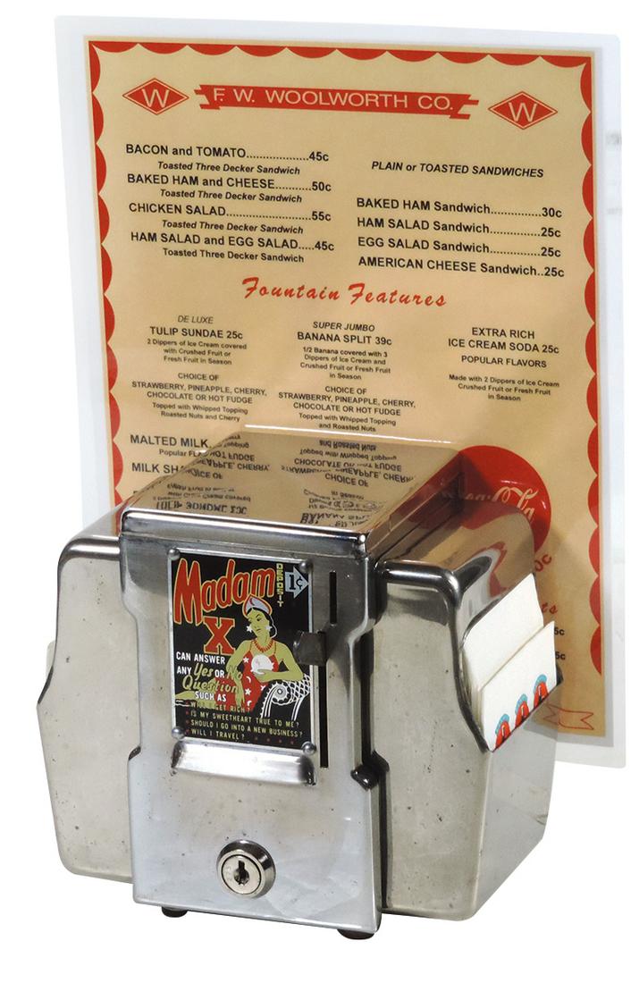 Coin-operated Madam X card vendor, 1 Cent, dispenses: Coin-operated Madam X card vendor, 1 Cent, dispenses cards that can answer any yes or no question, napkin holders on sides & F. W. Woolworth Co. repro menu card, complete w/deck of cards, Exc working 