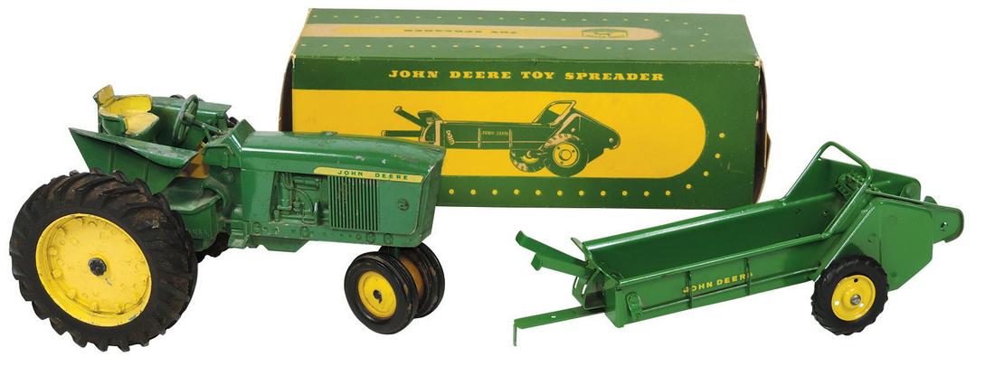 Farm Toys, John Deere Tractor & Spreader in box, 3020: Farm Toys, John Deere Tractor & Spreader in box, 3020 tractor, 1:16 scale Ertl, 1960's & John Deere Spreader w/orig box, tractor in VG cond w/minor paint loss & no muffler, spreader in Near-Mint never