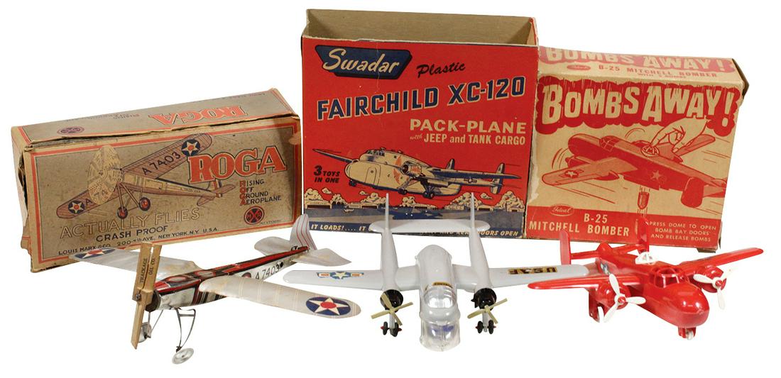 Toy Airplanes (3), Marx ROGA paper/tin flying model,: Toy Airplanes (3), Marx ROGA paper/tin flying model, Swadar Fairchild XC-120 plastic model & Ideal "bombs away" plastic model, all in orig boxes, VG or better cond, Marx shows wear & use, boxes w/dist