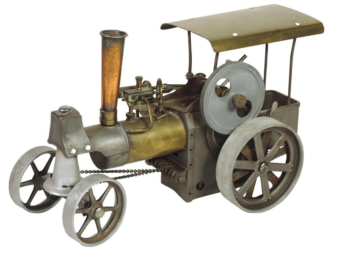 Farm Toy, Steam Tractor, c.1960 Wilesco Model D40, live: Farm Toy, Steam Tractor, c.1960 Wilesco Model D40, live steam-driven tractor w/steerable wheels, VG cond w/dust & grime, untested, 8"H x 13"L.