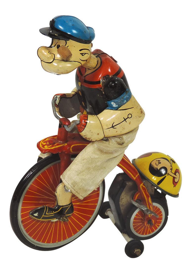 Toy Popeye Cyclist, Linemar Toys-Japan litho on tin: Toy Popeye Cyclist, Linemar Toys-Japan litho on tin windup, Popeye pedals in circles on high-wheel tricycle w/ringing bell showing Olive Oyl & Wimpy, marked King Features, Exc working cond w/1/4" L se