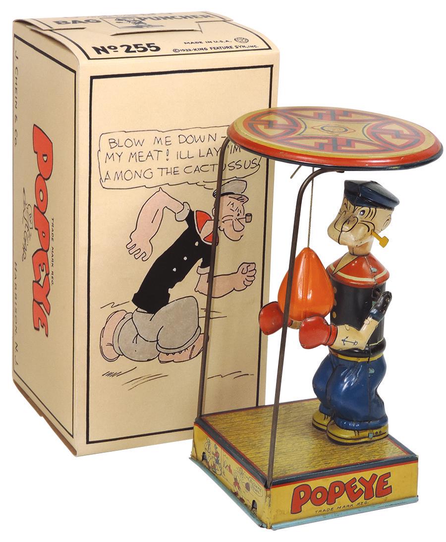 Toy Popeye Overhead Bag Puncher w/box, Chein litho on: Toy Popeye Overhead Bag Puncher w/box, Chein litho on tin windup w/prof remanufactured box, toy marked King Features 1932, a Scarce toy w/fun fight graphics on front & back of base, Exc orig working c