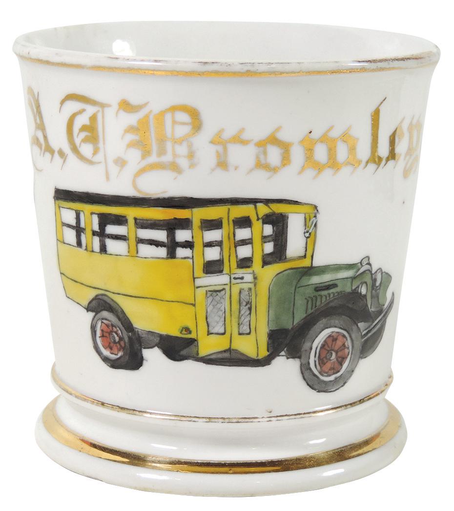 Occupational Shaving Mug, School Bus Driver, bottom: Occupational Shaving Mug, School Bus Driver, bottom stamped Berninghaus-Cincinnati w/decorator no., personalized A. T. Bromley, Exc+ cond w/minor wear on gold bands, 3 5/8"H.