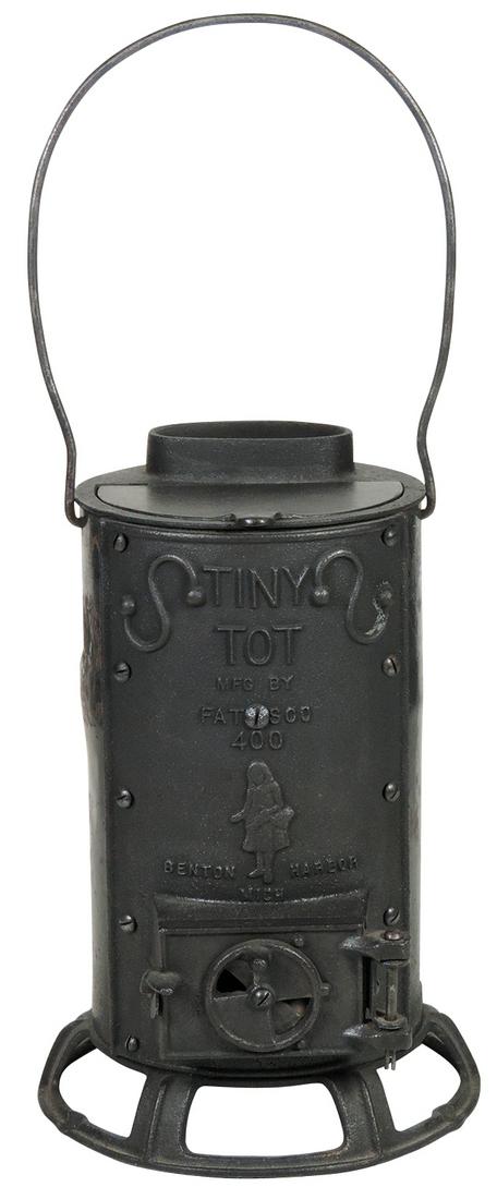 Salesman Sample or Child's Stove, Tiny Tot, mfgd by: Salesman Sample or Child's Stove, Tiny Tot, mfgd by Fatsco-Benton Harbor, Mich., cast iron & steel, Exc cond, 33"H x 9"Dia at base.