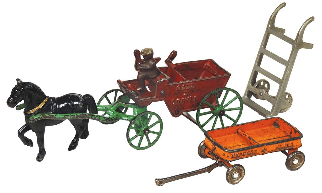 Toys (3), Kenton "Sand and Gravel" horse-drawn cart: Toys (3), Kenton "Sand and Gravel" horse-drawn cart w/driver, Champion "Express Flyer" wagon & a baggage cart, all cast iron w/orig paint, VG cond w/normal paint wear, largest 10.5"L.