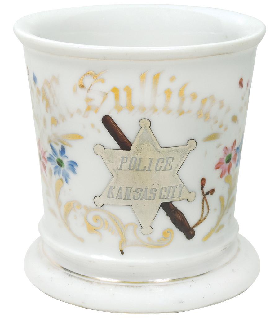 Occupational Shaving Mug, Police, Kansas City, silver: Occupational Shaving Mug, Police, Kansas City, silver badge & wooden night stick, Heckel Bros-K.C. Mo. in gold on bottom, personalized M. Sullivan, Exc cond w/some wear on thin bands & letters, 4"H.