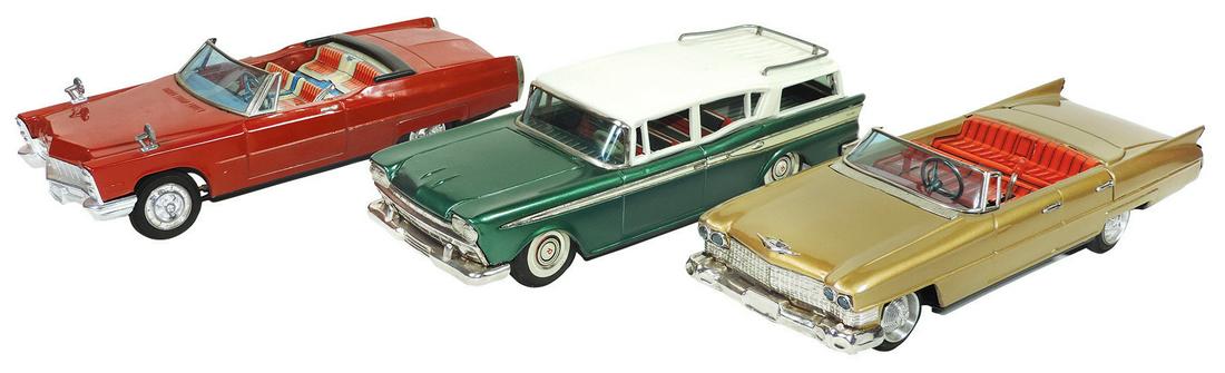 Toy Model Automobiles (3), 1960's Japan pressed tin by: Toy Model Automobiles (3), 1960's Japan pressed tin by Bandai, 2 battery-operated, 1963 Cadillac w/headlights, horn & gearshift, 1965 Cadillac w/horn & gearshifts & 1958 Rambler Ambassador wagon, ’5