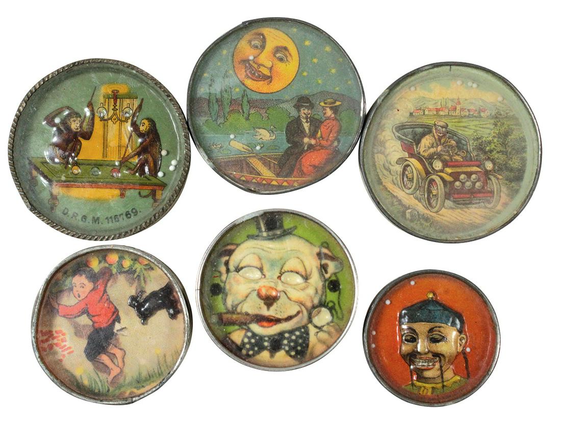 Toy Dexterity Puzzles (6), German litho, romantic "Man: Toy Dexterity Puzzles (6), German litho, romantic "Man in Moon", pool playing monkeys, an anthropomorphic dog, early automobile, dog biting boy & Chinaman, most in VG cond, largest 2.5"Dia.