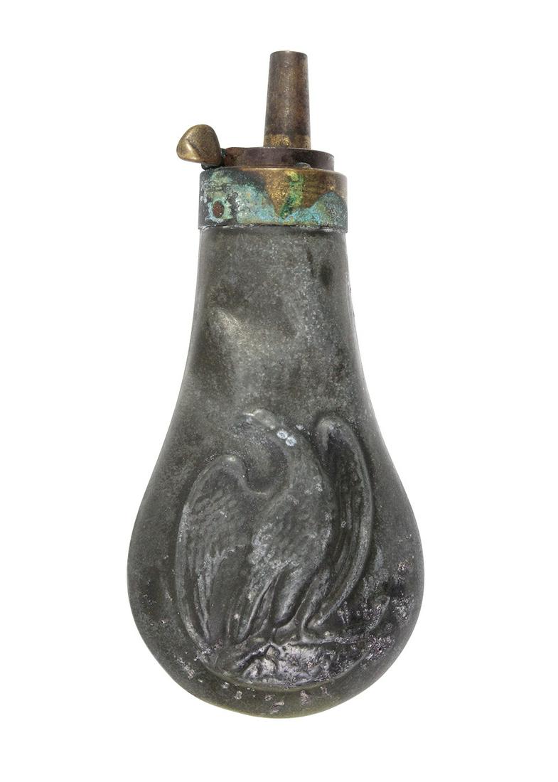 Firearms, Percussion Pistol Flask, Mid 19th Century: Firearms, Percussion Pistol Flask, Mid 19th Century Colt style zinc w/embossed eagle clutching a pistol, VG cond w/working dispenser, some oxidation & scattered pitting, has partial contents, 4.5"H.