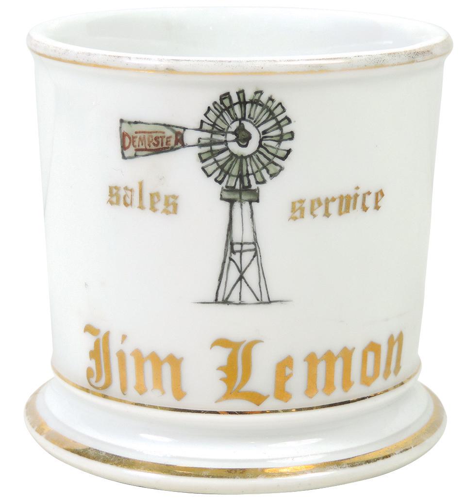 Occupational Shaving Mug, Windmill Salesman and: Occupational Shaving Mug, Windmill Salesman and Service, windmill marked "Dempster", bottom stamped Made in Germany, personalized Jim Lemon, Exc+ cond w/minor wear on gold bands, 3 3/8"H.