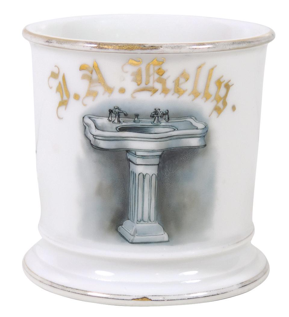 Occupational Shaving Mug, Plumber, Early Pedestal Sink,: Occupational Shaving Mug, Plumber, Early Pedestal Sink, bottom marked T&V-Limoges France, personalized J.A. Kelly, Exc cond w/minor loss on gold bands, 3.5"H.
