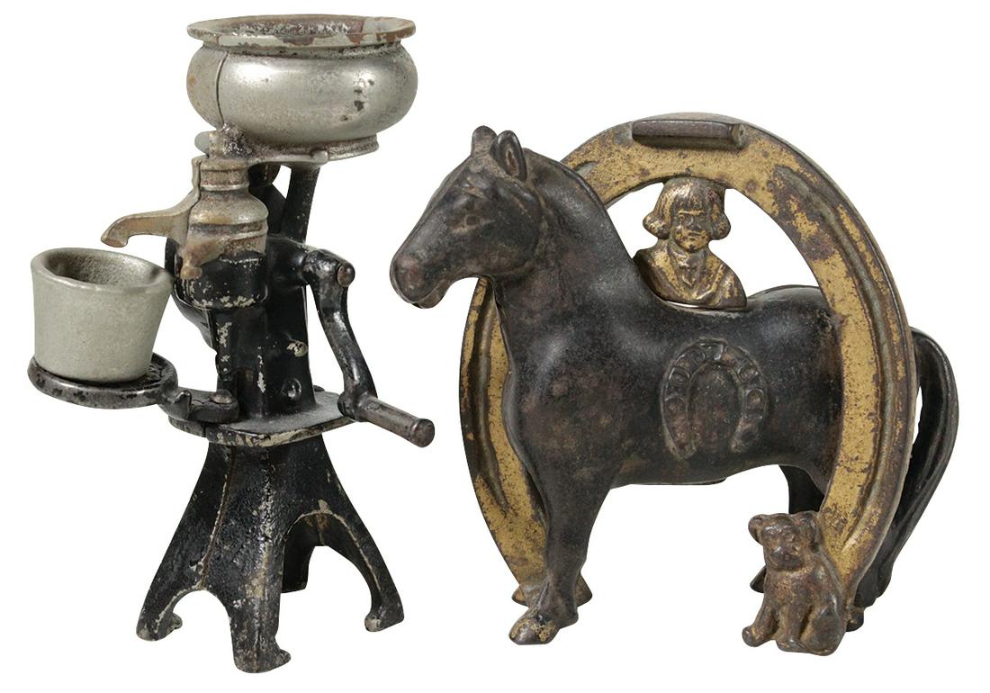 Still Banks (2), Arcade McCormick-Deering Separator &: Still Banks (2), Arcade McCormick-Deering Separator & Buster Brown "Good luck" horseshoe, cast iron w/orig paint, VG cond w/some paint wear, largest 5”H.