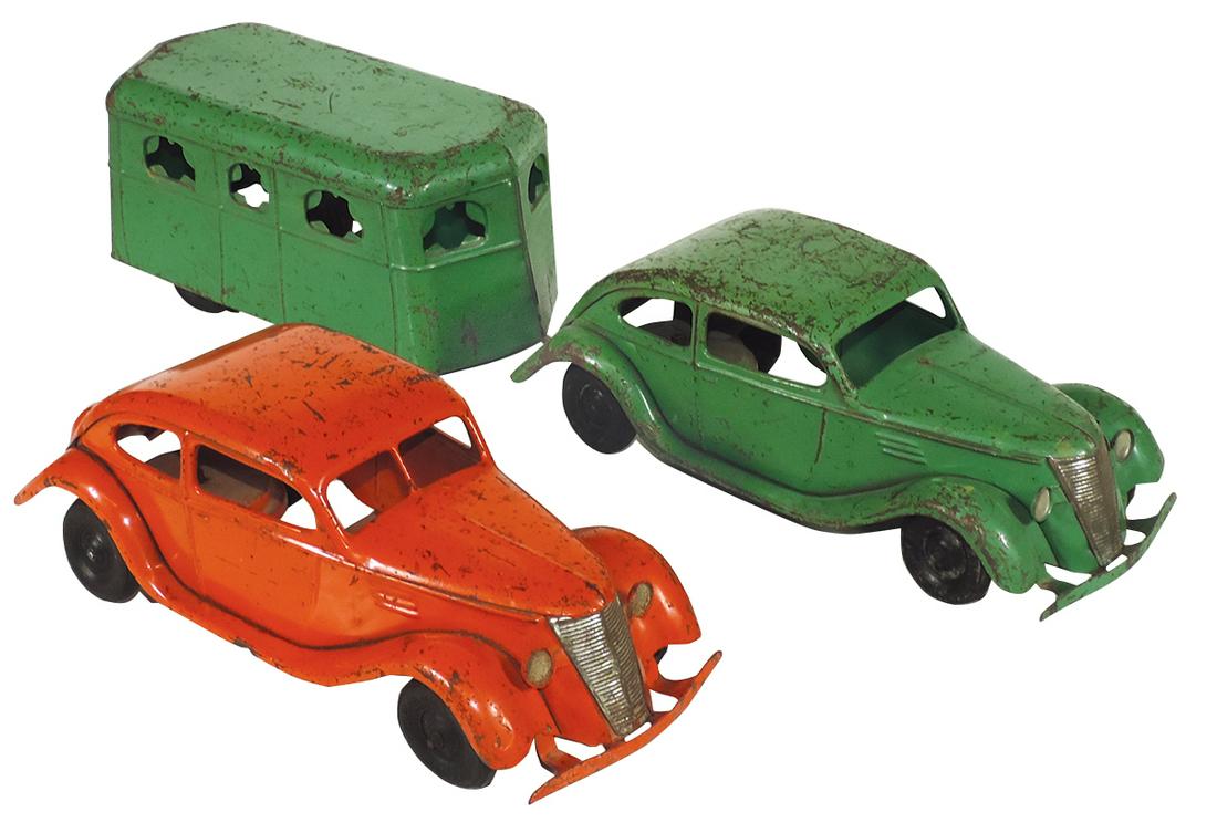 Toys (3), (2) Kingsbury Sedans-one w/travel trailer,: Toys (3), (2) Kingsbury Sedans-one w/travel trailer, 1930's pressed steel, Good to VG cond showing wear & trailer curtains absent, 10" & 12"L.