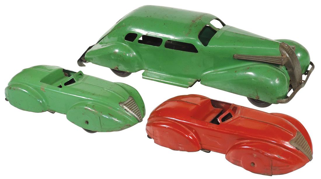 Toys (3), Wyandotte pressed steel 1930's touring sedan: Toys (3), Wyandotte pressed steel 1930's touring sedan & 2 pull back racers, Good cond w/wear and use, loose wheels on green car, 10" to 15.5"L.
