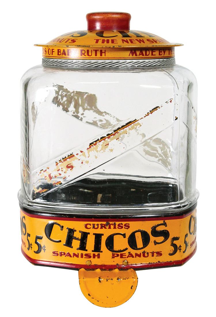 Country Store Chicos Spanish Peanut Jar, embossed glass: Country Store Chicos Spanish Peanut Jar, embossed glass & litho on tin lid & base w/shelf tab, VG cond w/wear on decals, 12.5"H.