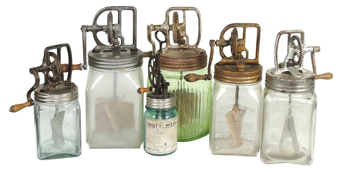 Kitchenware Butter Churns (6), c.1920: Kitchenware Butter Churns (6), c.1920's, (2) Dazey #30, Dazey 2 qt, Dazey #20, one unmarked w/green canister base, unmarked 1 qt & a blue glass "Holt's Butter Merger" w/paper label, Exc cond, others G