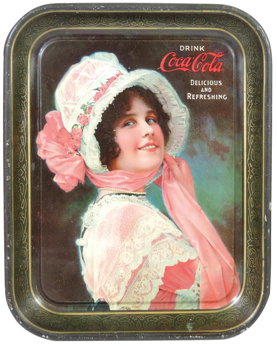 Coca-Cola Serving Tray, 1914, Betty, litho on metal by: Coca-Cola Serving Tray, 1914, Betty, litho on metal by Passaic Metal Ware Co., VG+ to Exc cond w/great color & gloss, 13"H x 10.5"W.