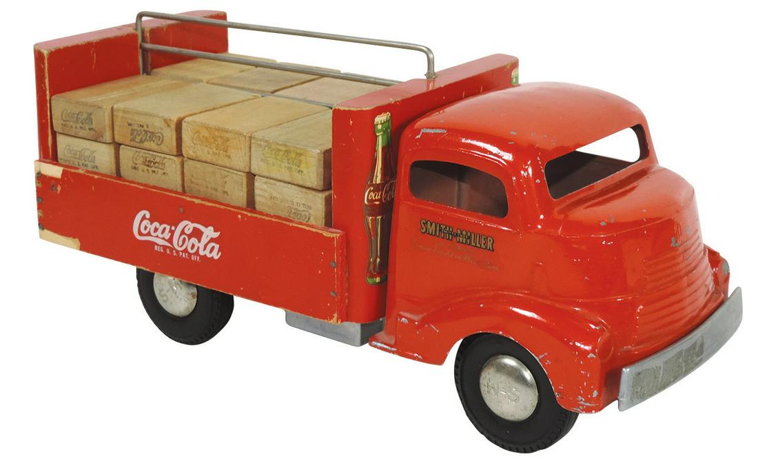 Coca-Cola Toy Delivery Truck, Smith-Miller, 1940: Coca-Cola Toy Delivery Truck, Smith-Miller, 1940's, wood & metal w/16 orig Coca-Cola wood blocks (cases), a Rare truck in VG+ cond w/minor paint wear & minor wood chips at bottom, 13.5"L.