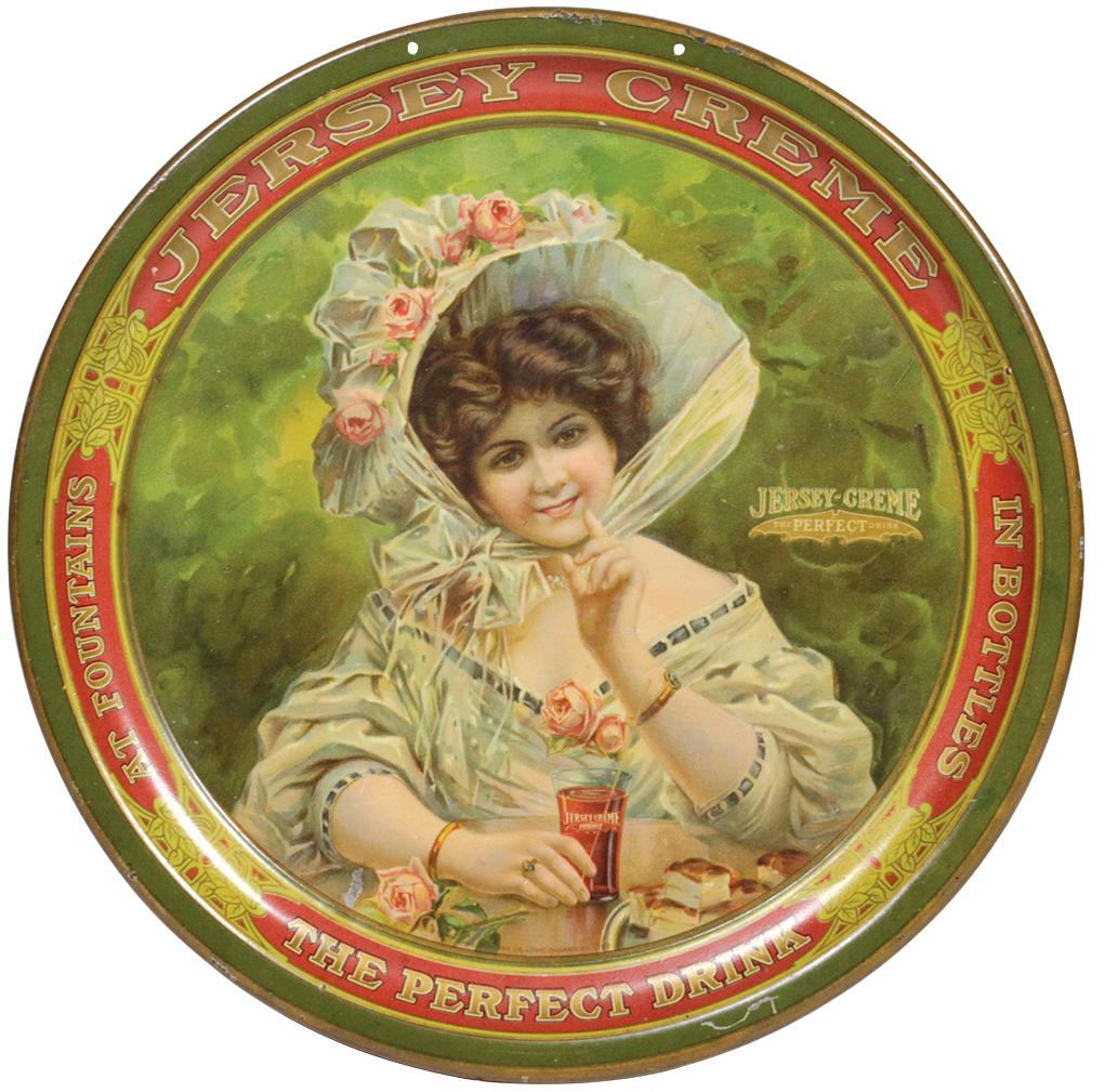 Soda Fountain Tray, Jersey Creme, "The Perfect Drink",: Soda Fountain Tray, Jersey Creme, "The Perfect Drink", litho on tin by Chas. Shonk Co.-Chicago, scene w/beautiful young lady, c.1900, VG cond w/some minor dings & touch-ups, 12"Dia.