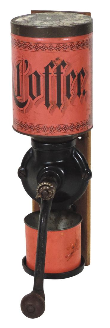Coffee Grinder, mfgd by Parker & Bingham for Fanner: Coffee Grinder, mfgd by Parker & Bingham for Fanner Mfg., wall mounted, cast iron base w/litho on tin hopper, complete w/orig paint & catch cup, later 1800's, unusual, VG+ cond, 13.5"H x 4.5"W.
