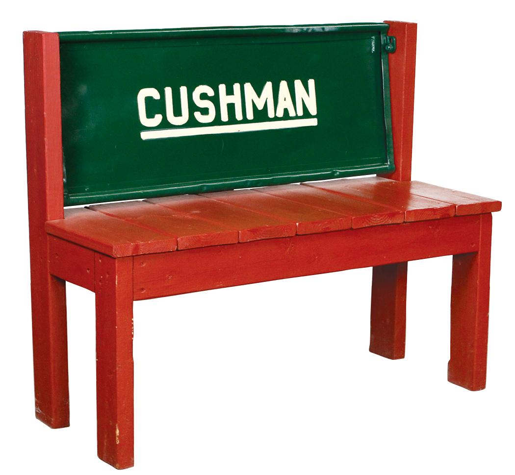 Automobile Bench, Cushman garden bench, pressed steel &: Automobile Bench, Cushman garden bench, pressed steel & wood, 1960's embossed letter Cushman tail gate back mounted on a stained redwood base, VG to Exc cond, 21.5"H x 37.5"W x 15"D.