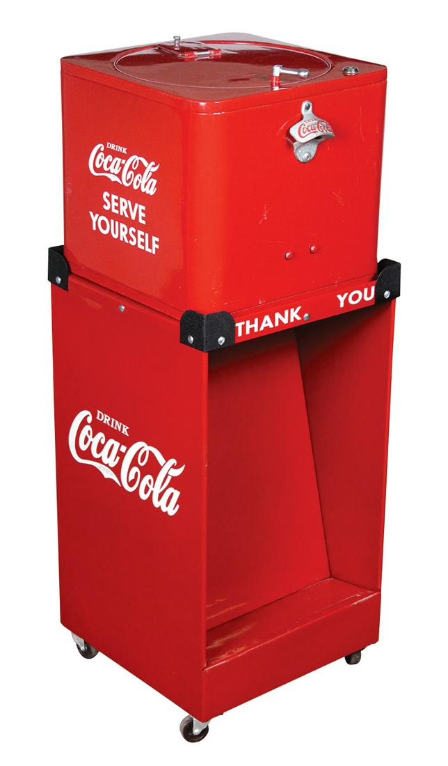 Coca-Cola Cooler, "Spin Top Nickel Vending Cooler",: Coca-Cola Cooler, "Spin Top Nickel Vending Cooler", contemporary 2-pc pressed steel w/rack for 12 bottles, center ice tube on a matching stand w/empty bottle shelf, Exc working cond w/a couple of pain