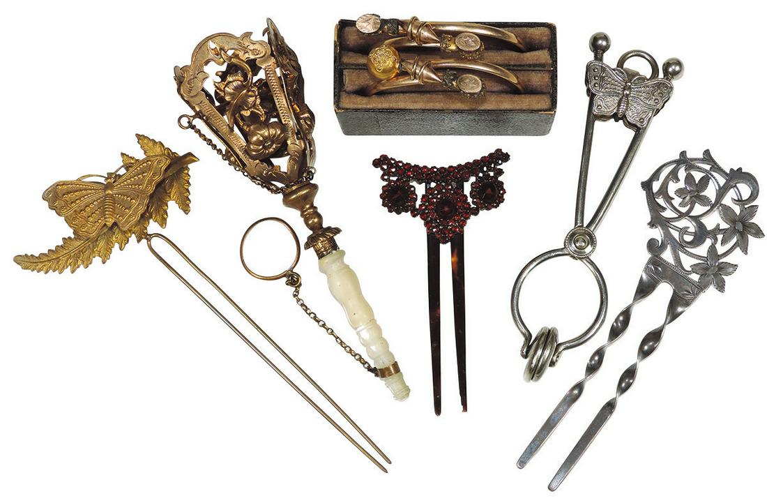 Victorian Vanity & Fashion (7), two dress/handkerchief: Victorian Vanity & Fashion (7), two dress/handkerchief holders, one gilt w/Mother of Pearl handle, embossed pinchbeck animated "butterfly & fern" hairpin, Sterling Silver hairpin, Garnet & Tortoise ha