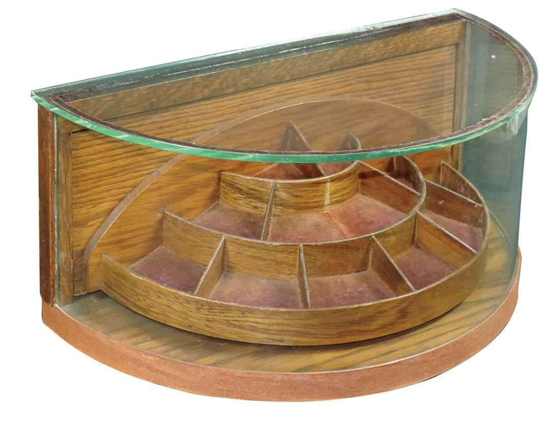 Country Store Collar Button Case, oak curved glass case: Country Store Collar Button Case, oak curved glass case w/patented rotating interior & multi-level divided compartments, brass tag on back reads "Pat. applied for", VG cond w/later veneer on base edge