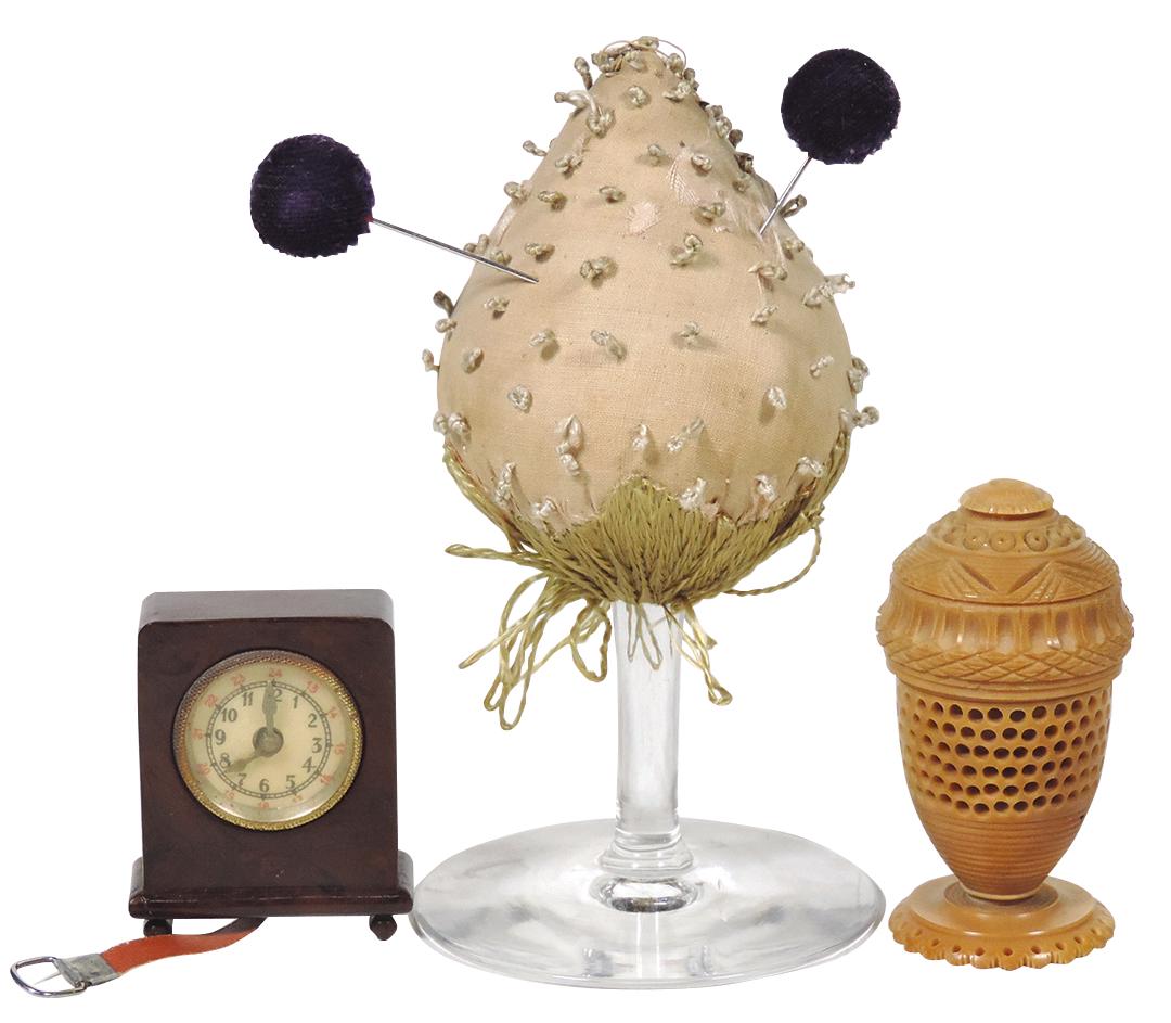 Sewing Novelties (3), Clock tape measure, strawberry: Sewing Novelties (3), Clock tape measure, strawberry pin cushion over wine glass & a carved tagua nut thimble case containing an expanding spiral cut tagua snake, all VG/Exc cond, largest 5.5"H.