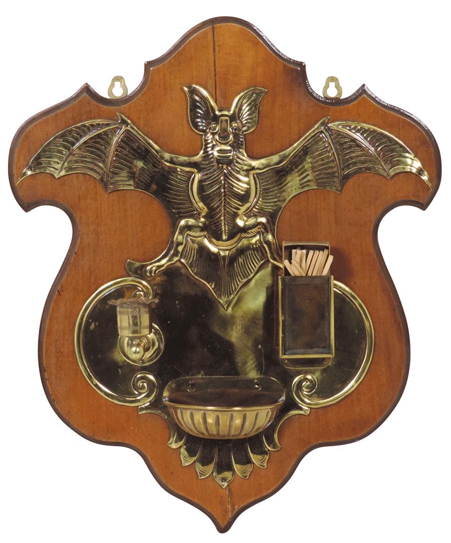 Lamp, unusual wall-mounted brass candle lamp, a candle: Lamp, unusual wall-mounted brass candle lamp, a candle holder surrounded by a bat w/open wings, has a spent match depository, matchbox holder & small beveled glass window in center for display, Exc re