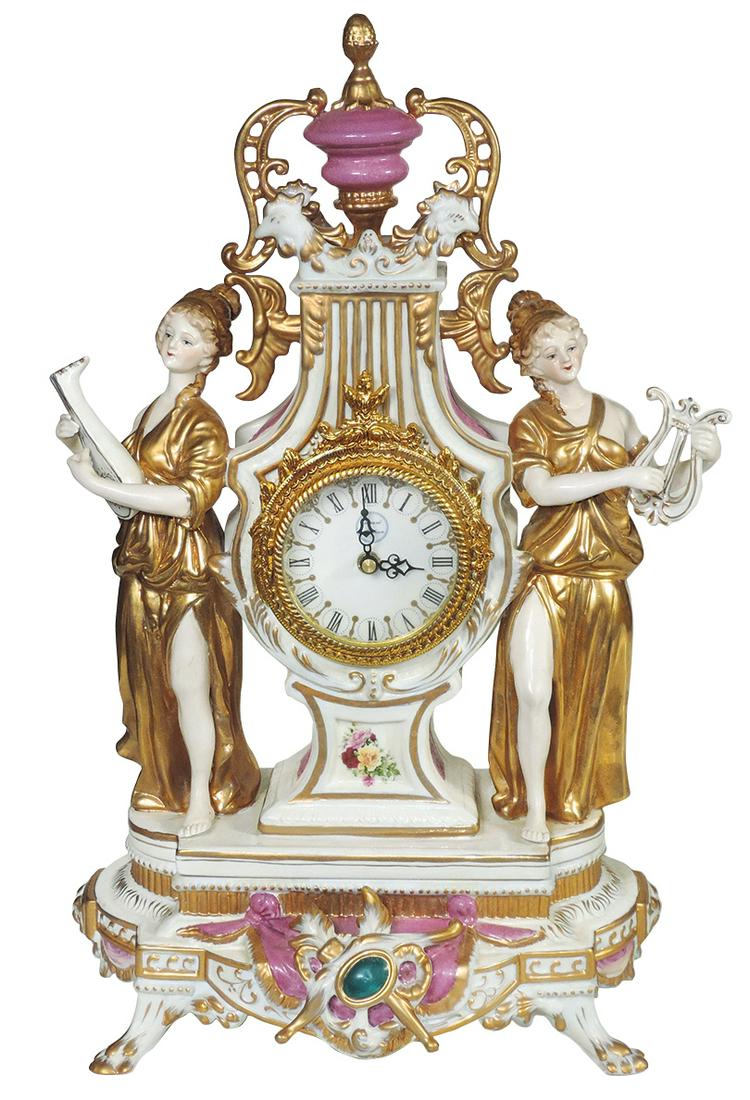 Clock, Meissen Style Figural Porcelain "Lyre" clock,: Clock, Meissen Style Figural Porcelain "Lyre" clock, 20th Century w/battery-operated movement flanked by ornately gilt musical figures, Richard Klemm style Dresden Germany backstamp, VG to Exc cond no