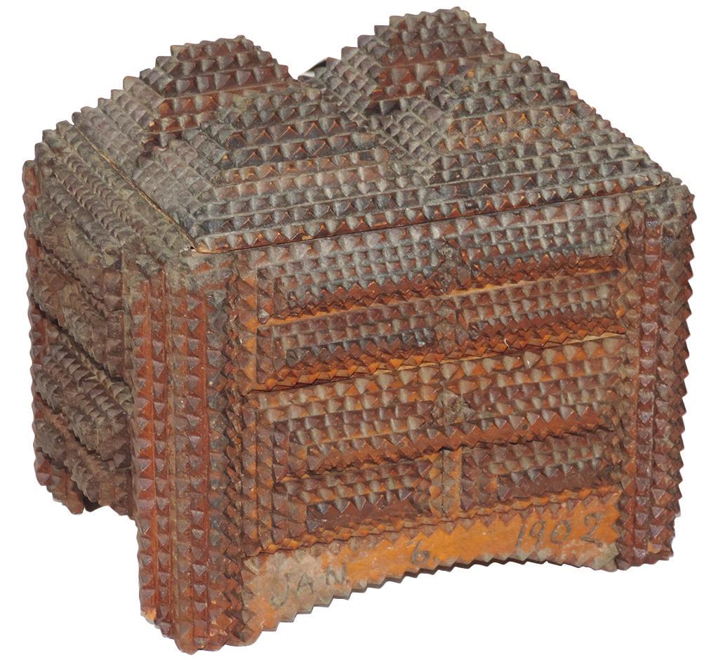 Tramp Art Box, chip carved Folk Art, dated Jan. 6,: Tramp Art Box, chip carved Folk Art, dated Jan. 6, 1902, multi-layered wood w/drawer, "Old Judge" tobacco label on lid interior, VG cond w/cover hinge detached & normal edge wear, 7.5"H x 9"W x 5.5"D.